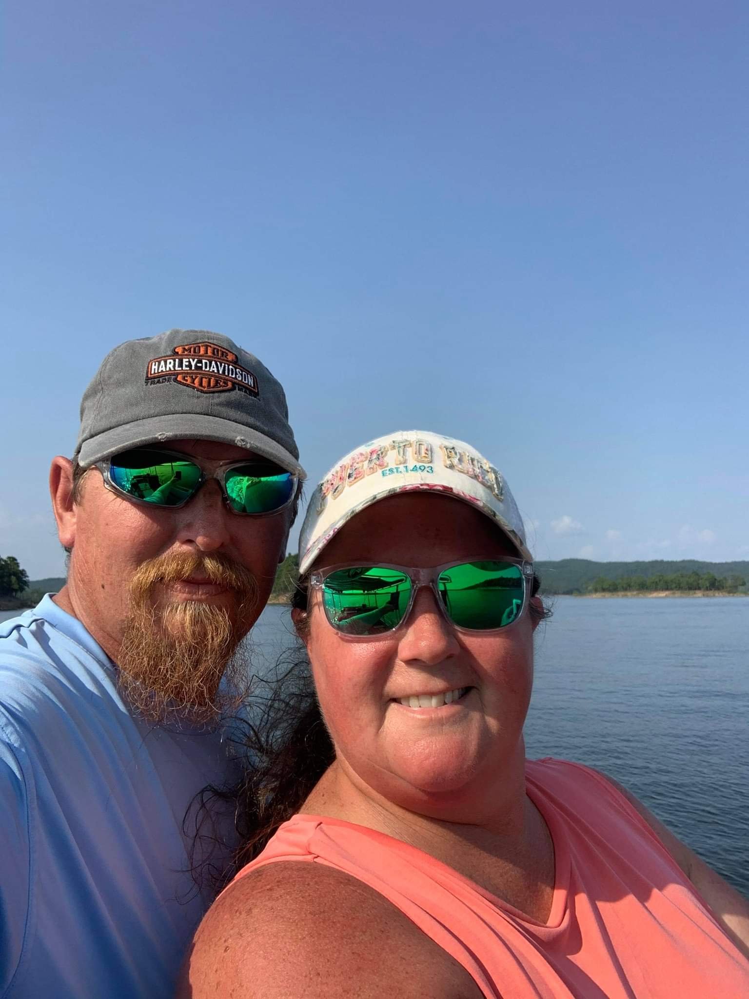 Lu and Allen Lawson selfie in fishing lake with smiling face